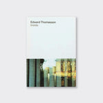 A white book cover with a photo of a window on it. The title of the book is inside by edward thomasson.