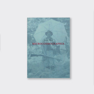 A blue art exhibition catalogue. The cover has a photo of a person wearing a hat and glasses and holding an umbrella and a gun. The book is called Microcosmographia by Mark Dion.