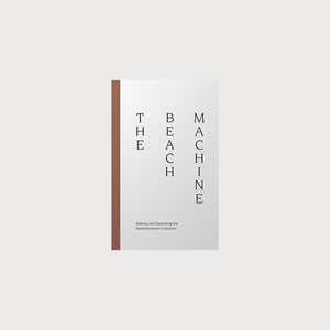 A white book with a brown spine titled The Beach Machine.