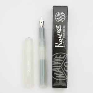 A transparent, white fountain pen made by Kaweco