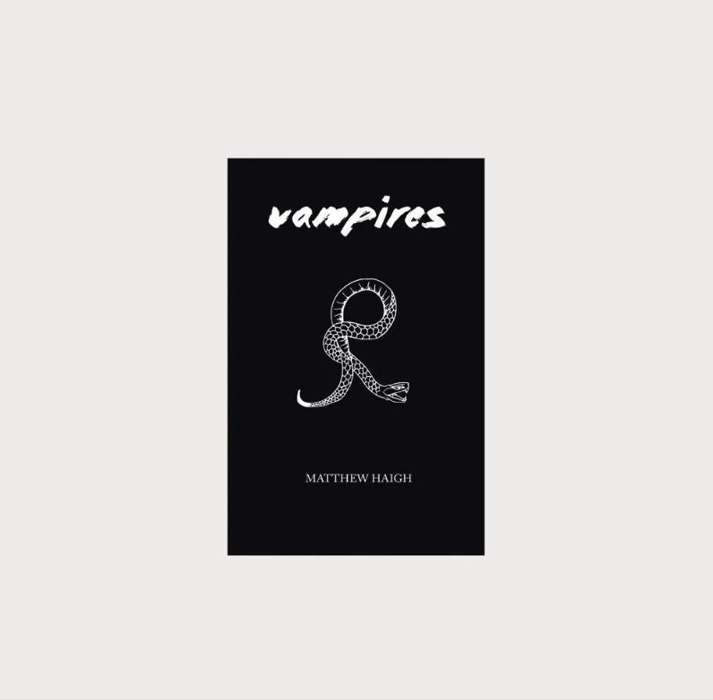 A black book with an illustration of a snake on it. The book is titled Vampires by Matthew Haigh.