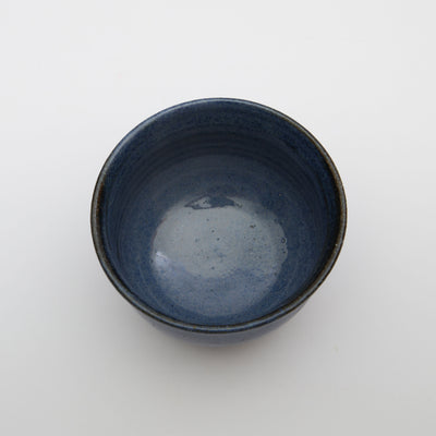 A small blue glazed ceramic bowl made by independent london-based artist Alice King. Made in East Dulwich South London 