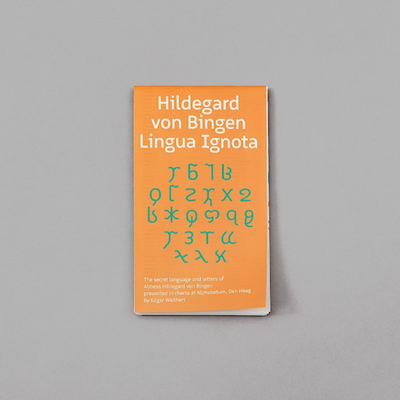 Orange cover of Hildegard von Bingen Lingua Ignota with green graphics on a grey background.