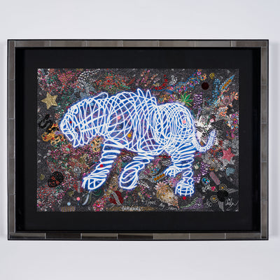 A colourful artist print by Chila Kumari Singh Burman. The print is a collage with lots of glitter and beads and a tiger made of neon lights.