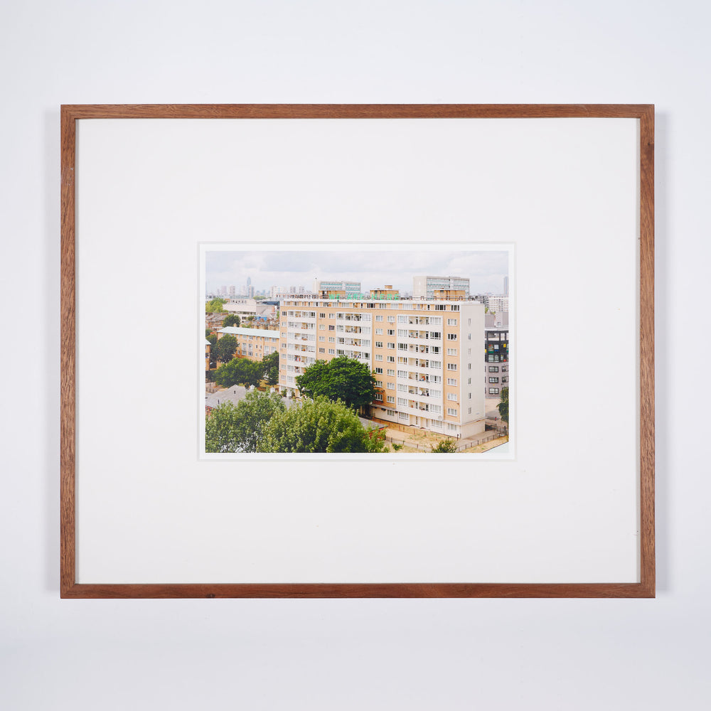 A framed photograph. This limited edition art work is titled We Are Here by artist Jessie Brennan.