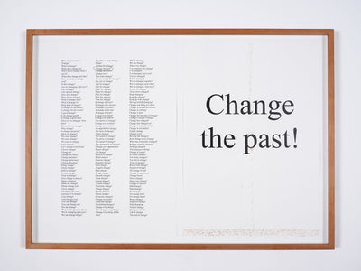 A framed limited edition artwork print. The print is white with grey text, on the right it reads Change the past!