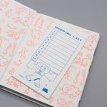 The inside cover of an illustrated cookbook. With a notebook shopping list.