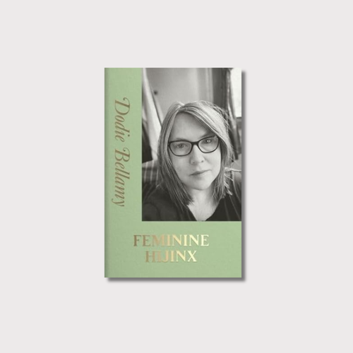 Minature book with green L shaped border with gold lettering horizontally which reads author name Dodie Bellamy, then in capital letters and gold the book title Feminine Hijinx. There is a photography of the author a white women, with black rimmed glasses, and shoulder length hair wearing a v neck top also on the cover.